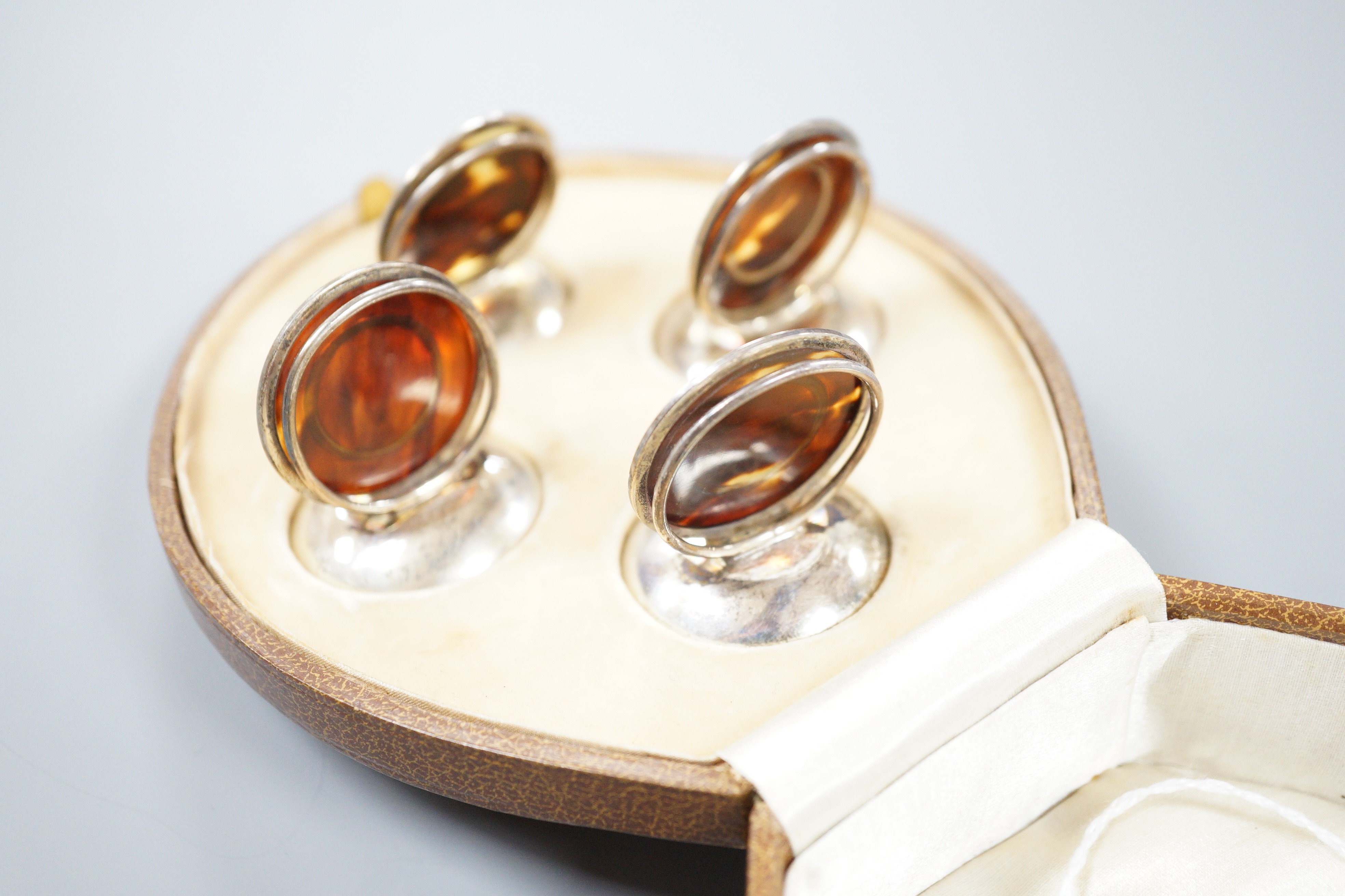 A cased set of George V four silver and tortoiseshell mounted menu holders, Levi & Salaman, Birmingham, 1913, 41mm.